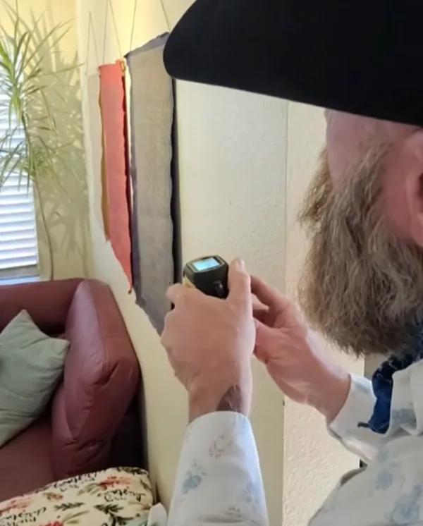 The Almighty Ruler measuring with a rigid laser instead of a flimsy tape measure